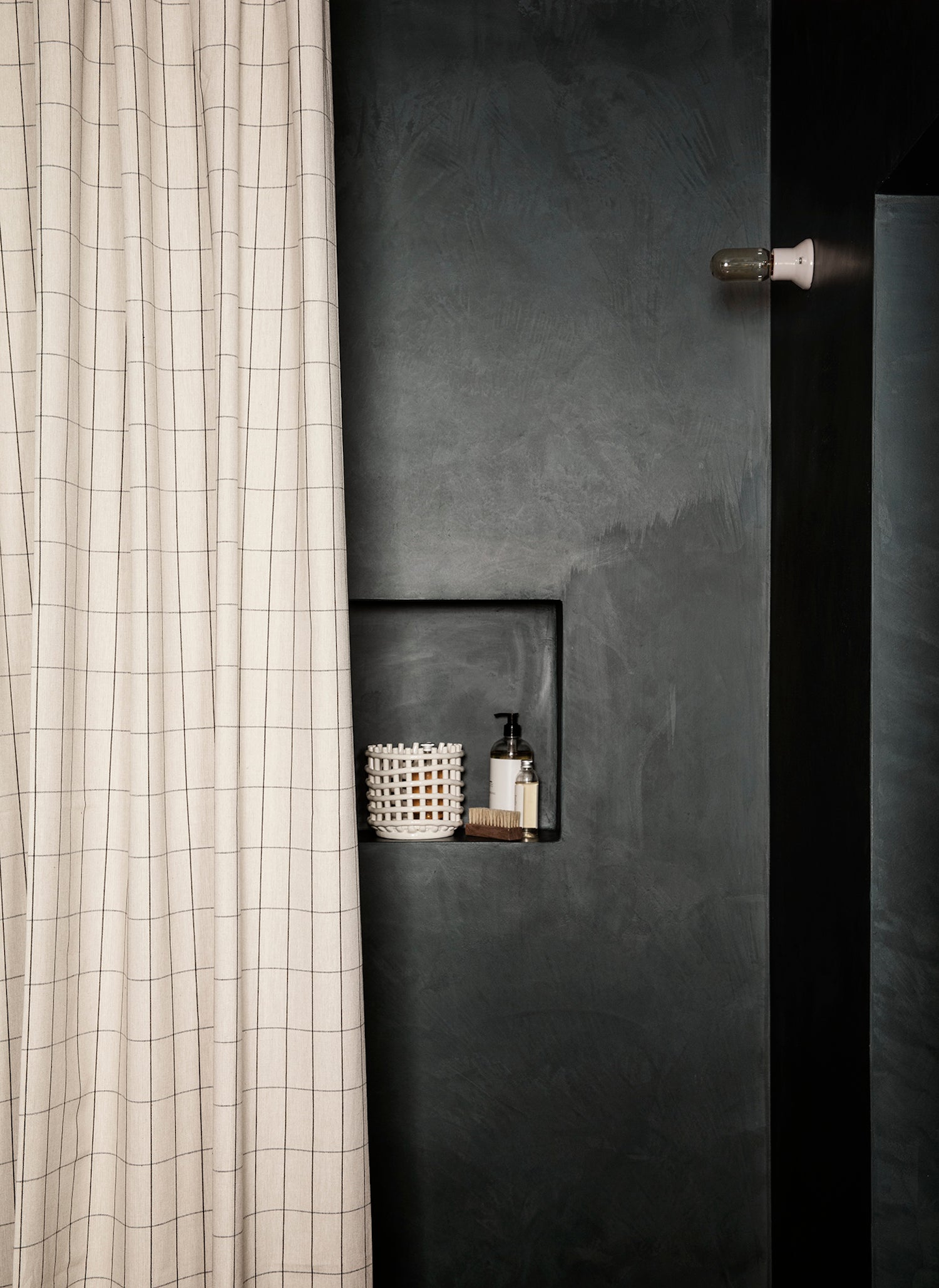 Chambray Shower Curtain. A geometric shower curtain with a grid pattern in beige and black crafted from GOTS certified, organic cotton chambray