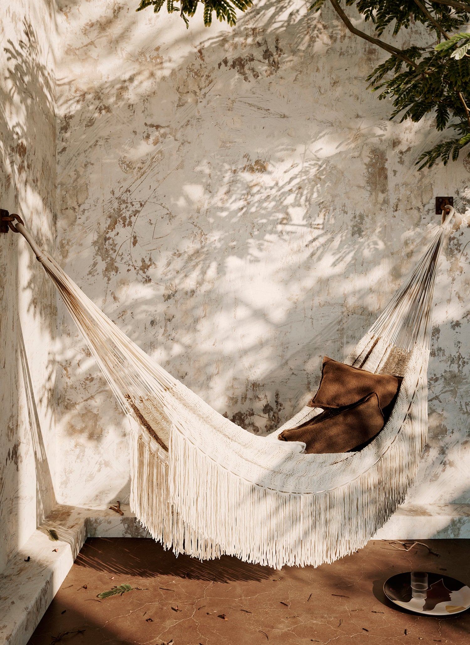 Path Hammock. A minimal bohemian hammock with two rows of fringing in beige.