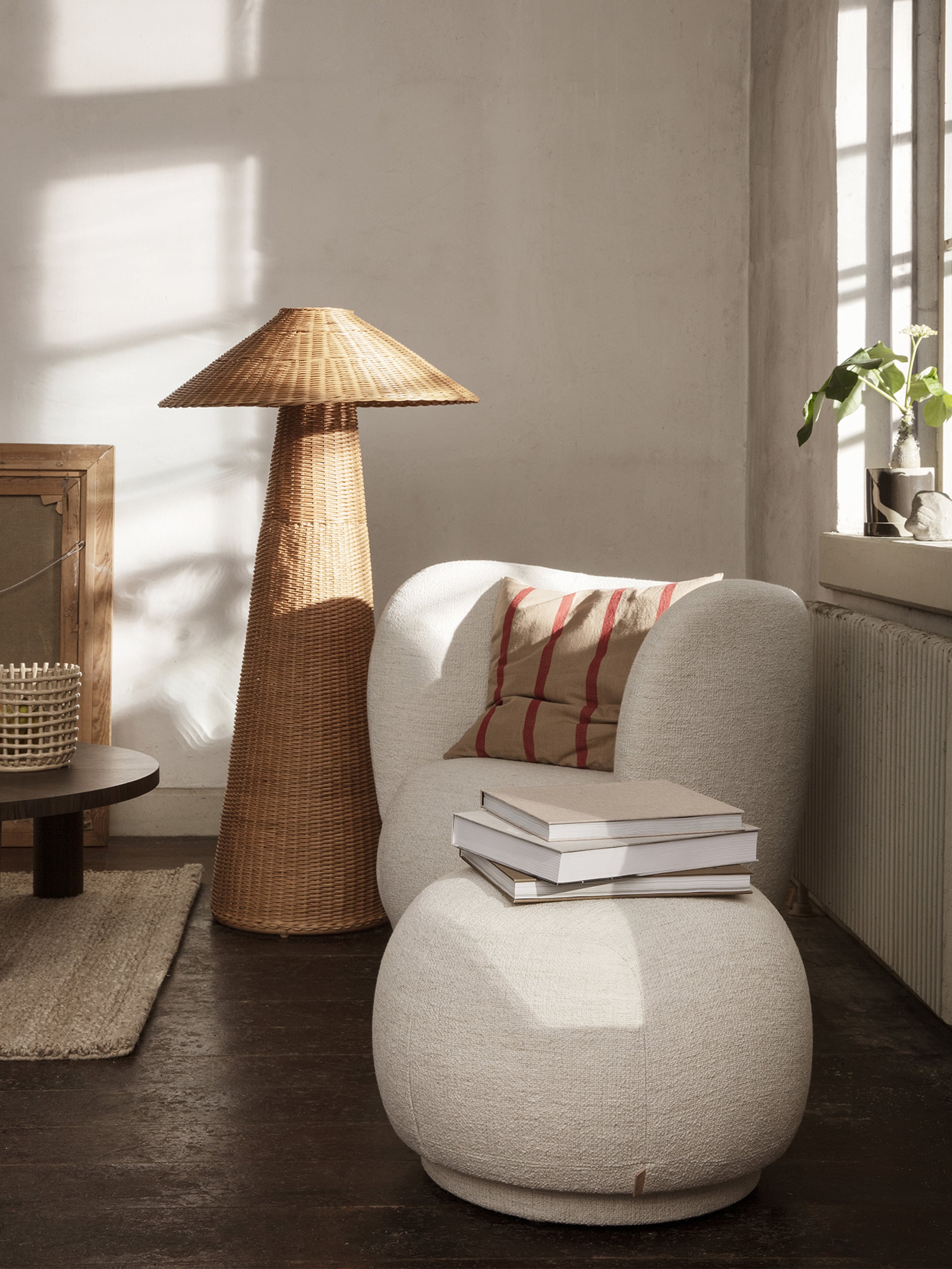 Rico Lounge Chair by Ferm Living in off white bouclé fabric in casual living room setting.