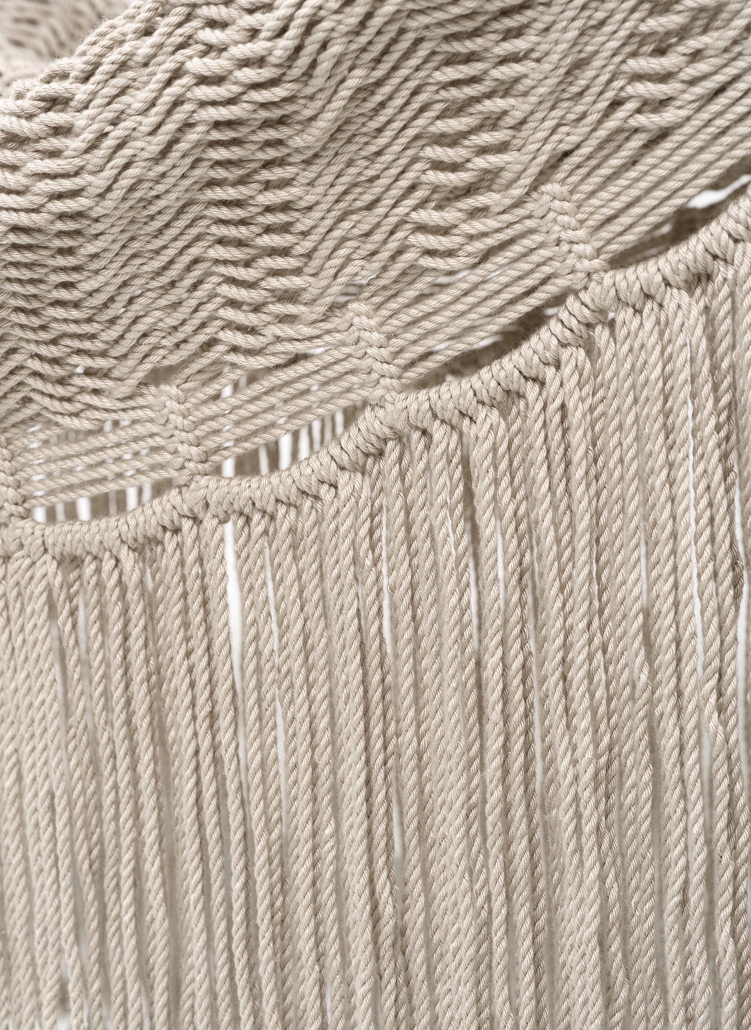 Path Hammock. A minimal bohemian hammock with two rows of fringing in beige.