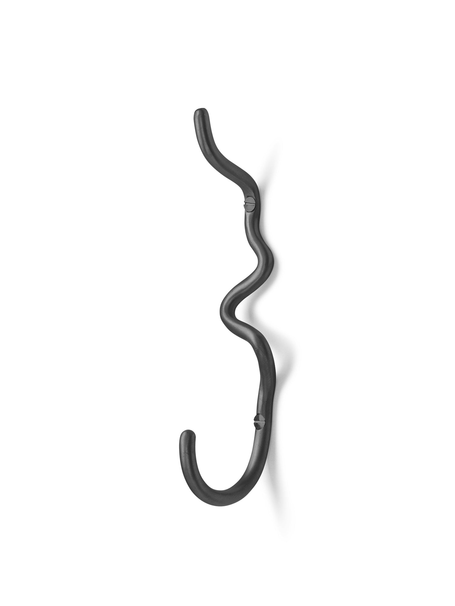 Black Curvature Hook. An organically shaped hook hand formed in black painted brass with a matte finish. 