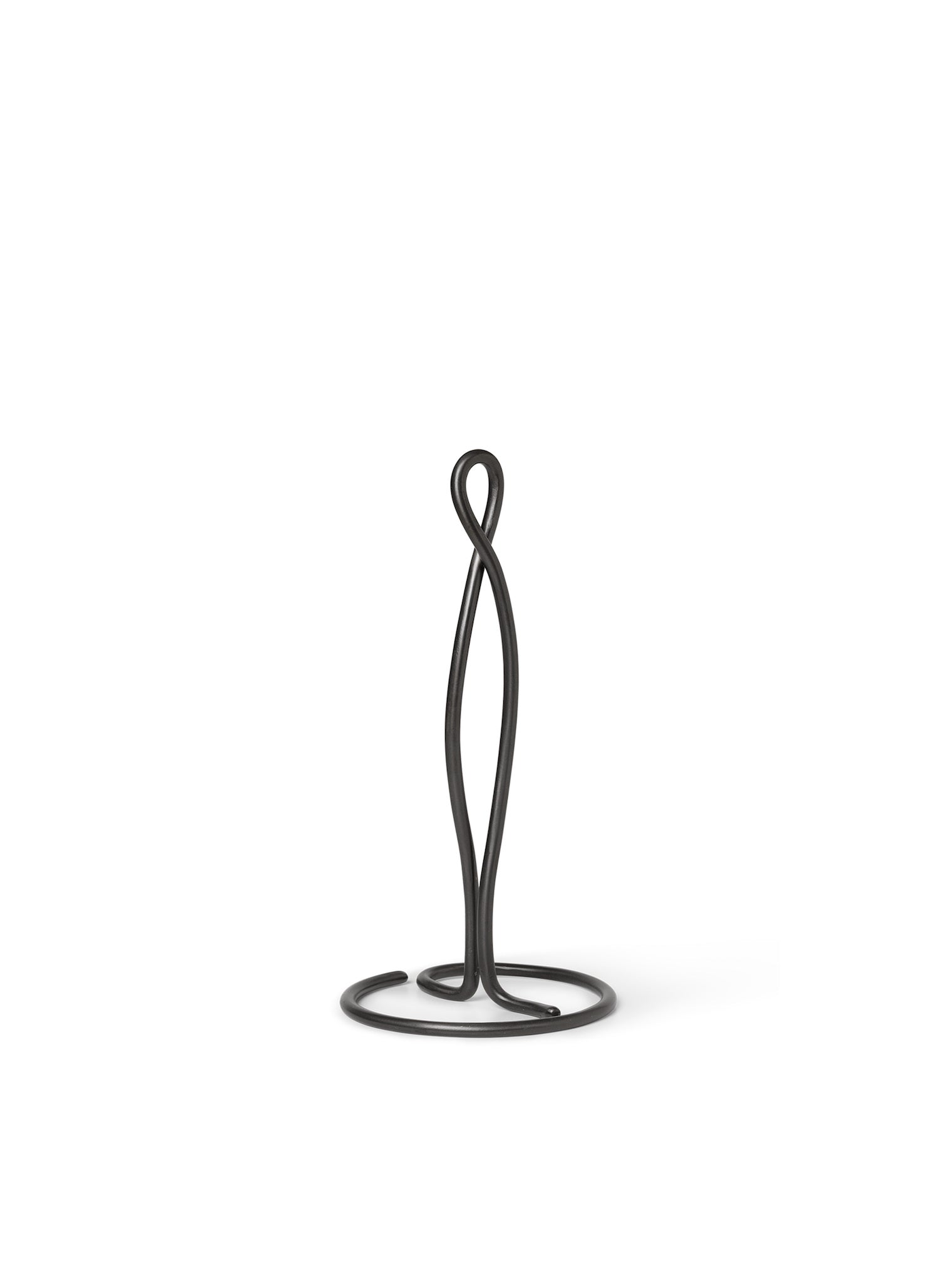 Organically shaped kitchen accessory hand formed in solid brass with a matte black patina finish. 