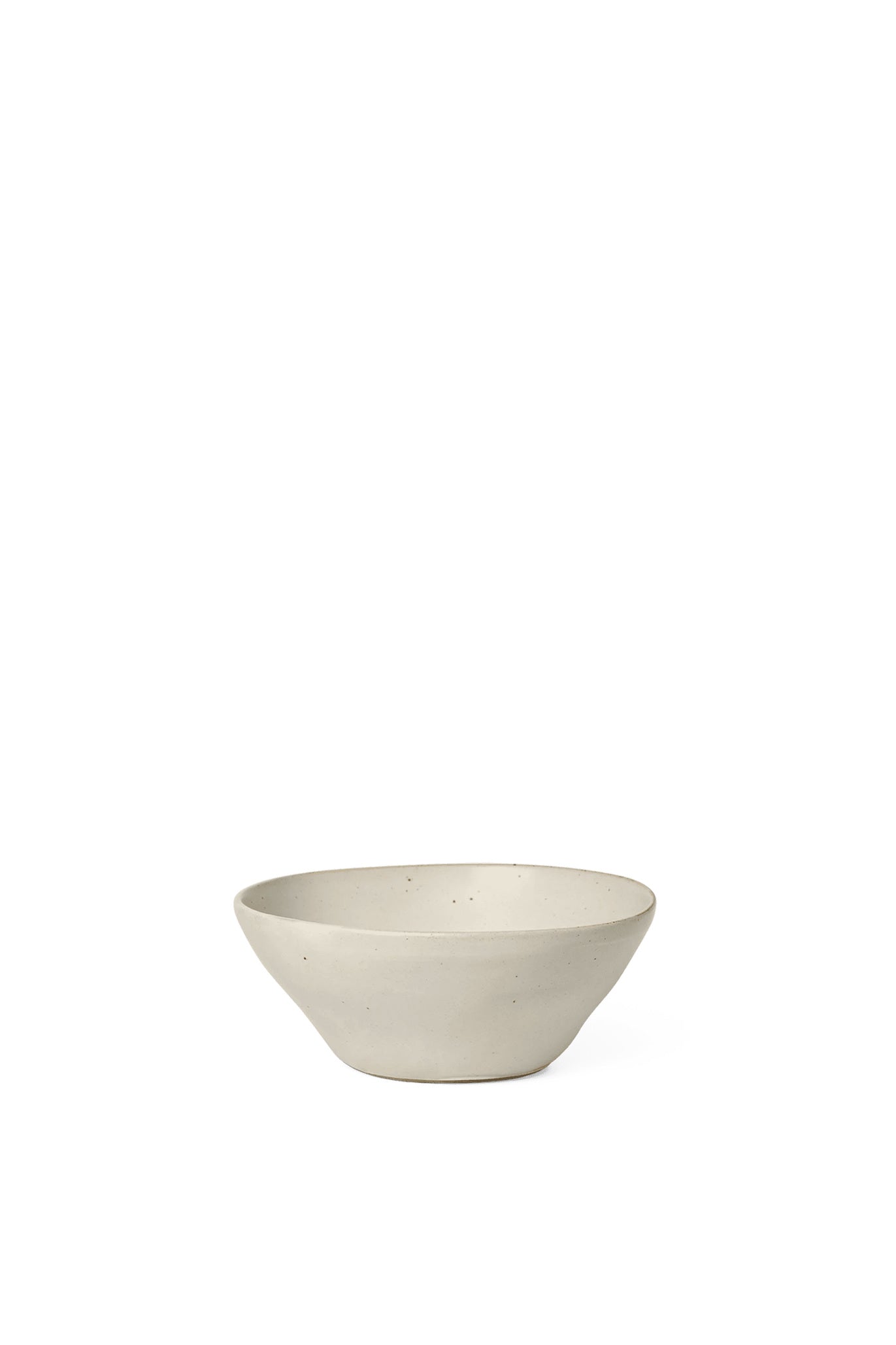 A perfectly imperfect serving bowl made to modern sensibilities using traditional craftsmanship techniques in off white.