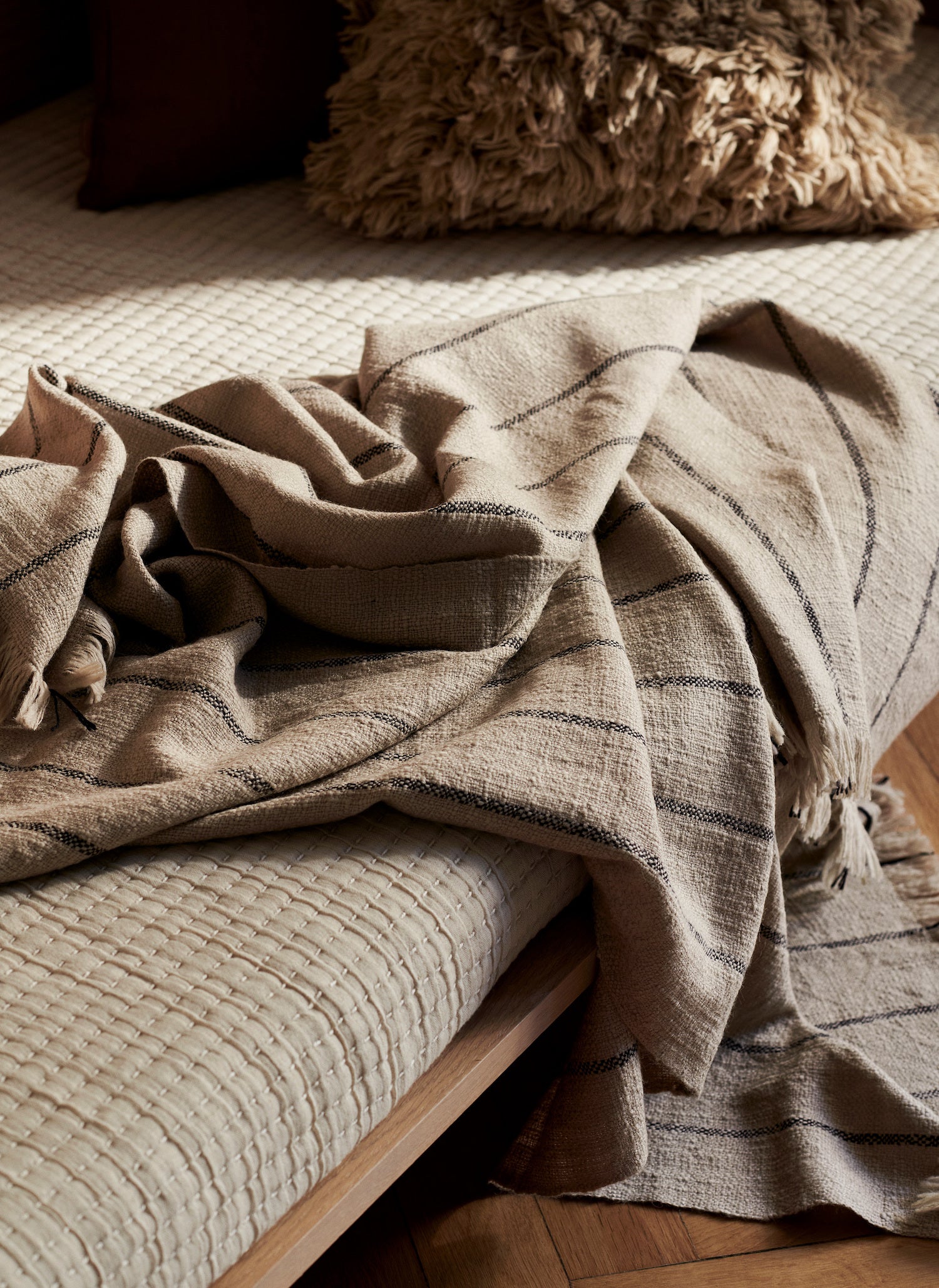 Calm Blanket. Like its name suggests, the Calm Blanket adds a feeling of tranquility to your space thanks to its muted hues and soothing lines. 