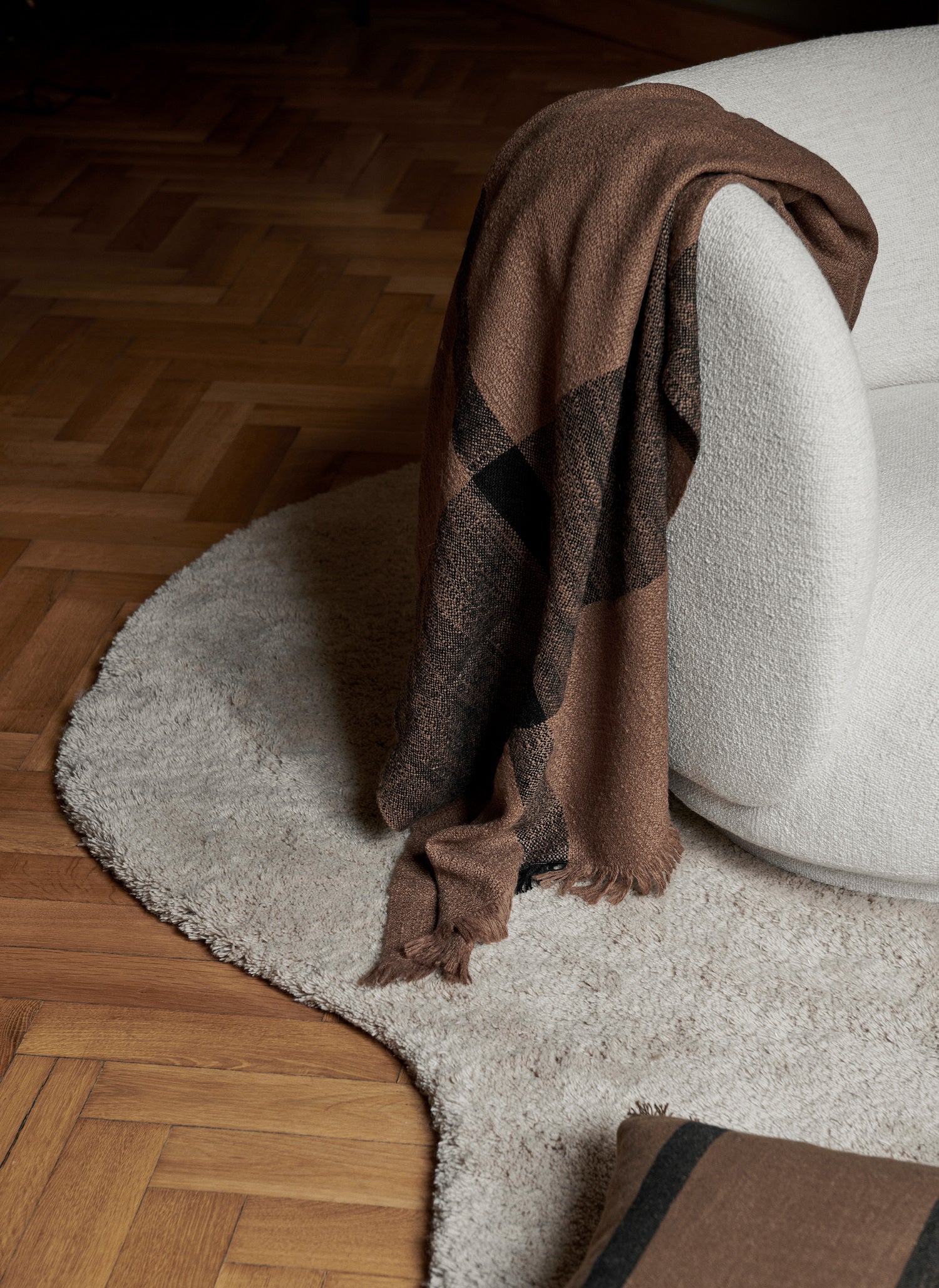Dry Blanket. A cozy blanket made entirely from an uneven wool yarn that will add a warm, inviting feeling to any space.