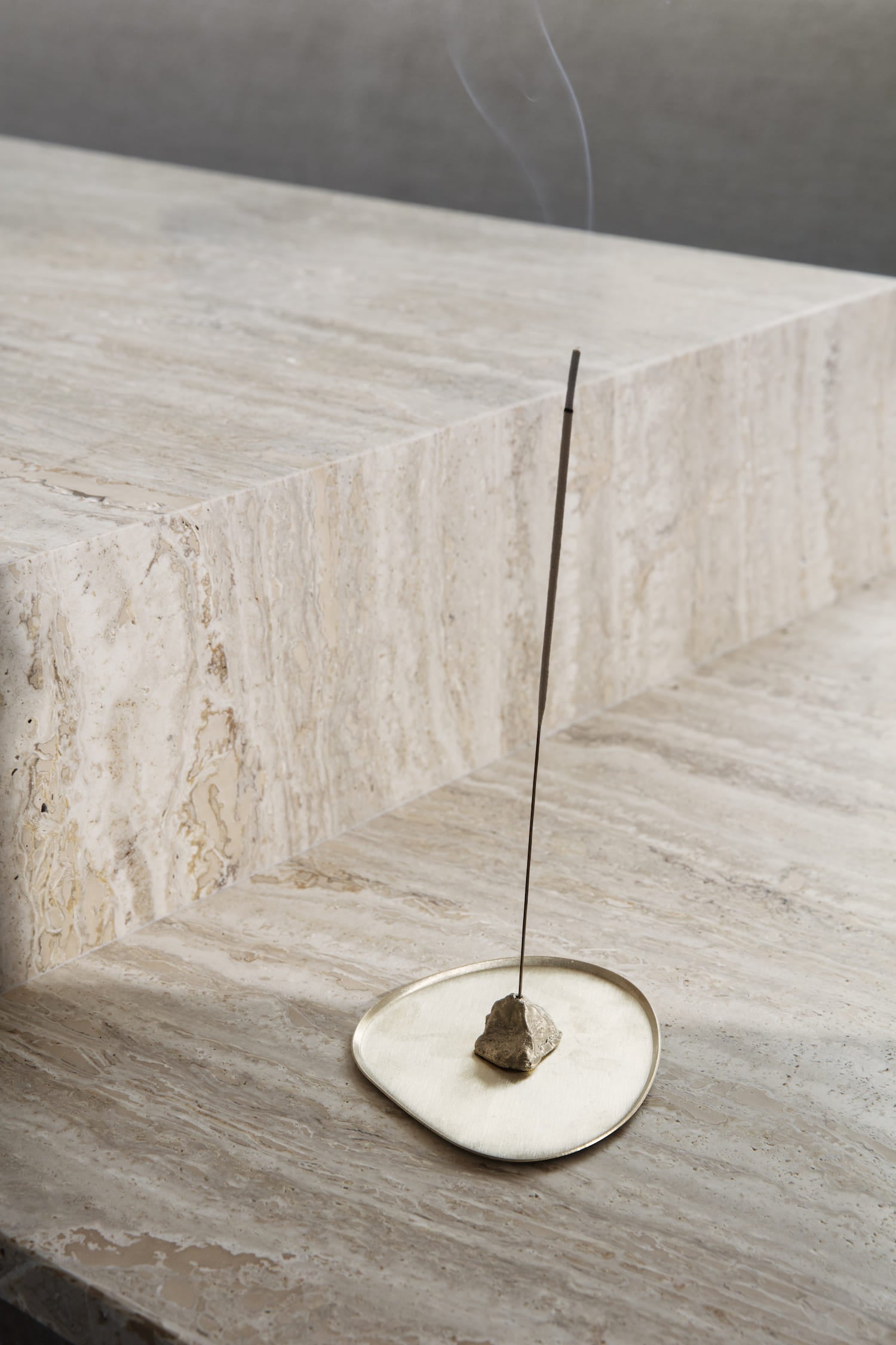 Stone Incense Burner. Minimalist incense burner made from cast stone over a rounded tray in matte brass designed to add tranquility to everyday living. 