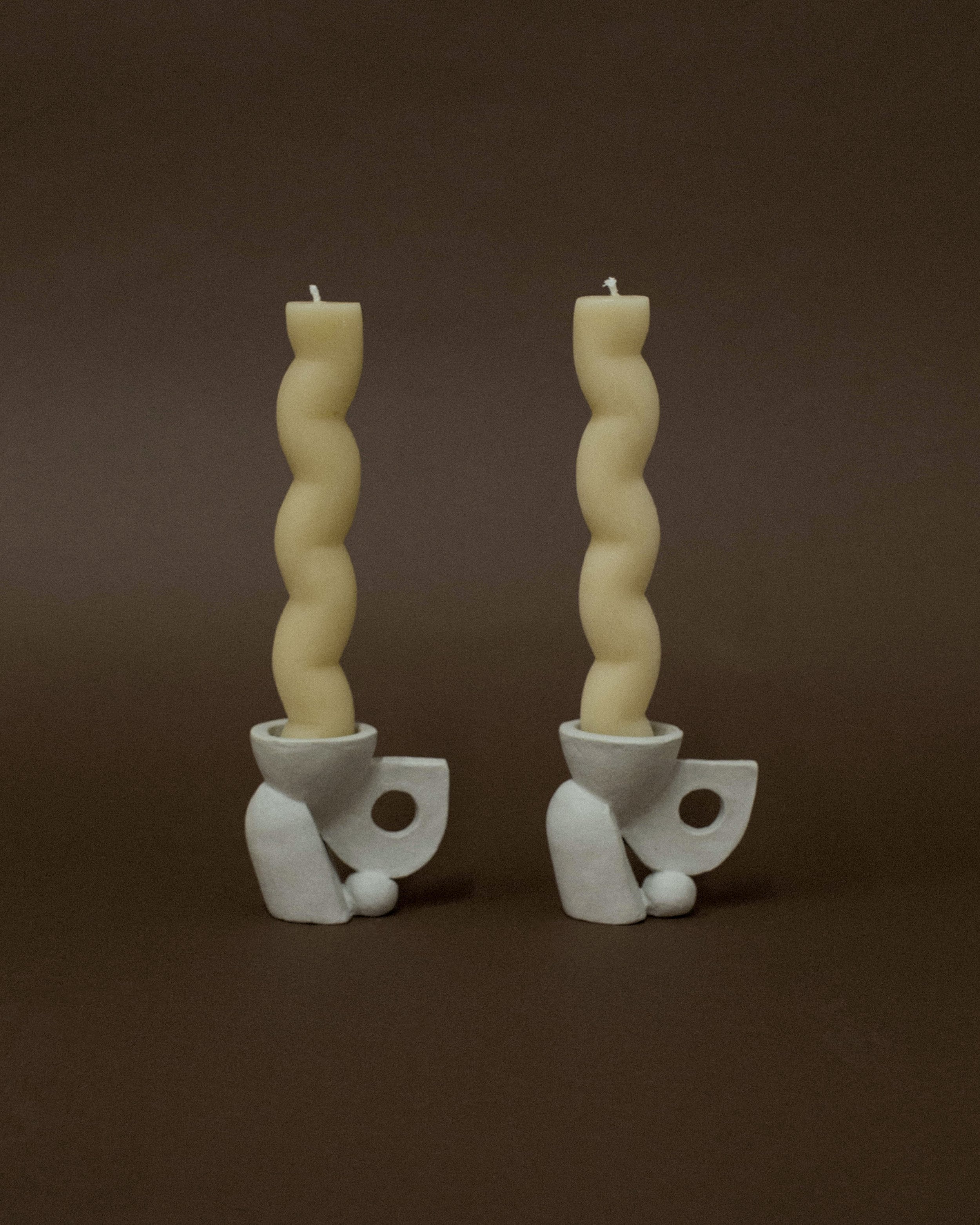 Build Candle Holder Pair. Sculptural abstract candleholders inspired by nature in natural grey ceramic stoneware. 