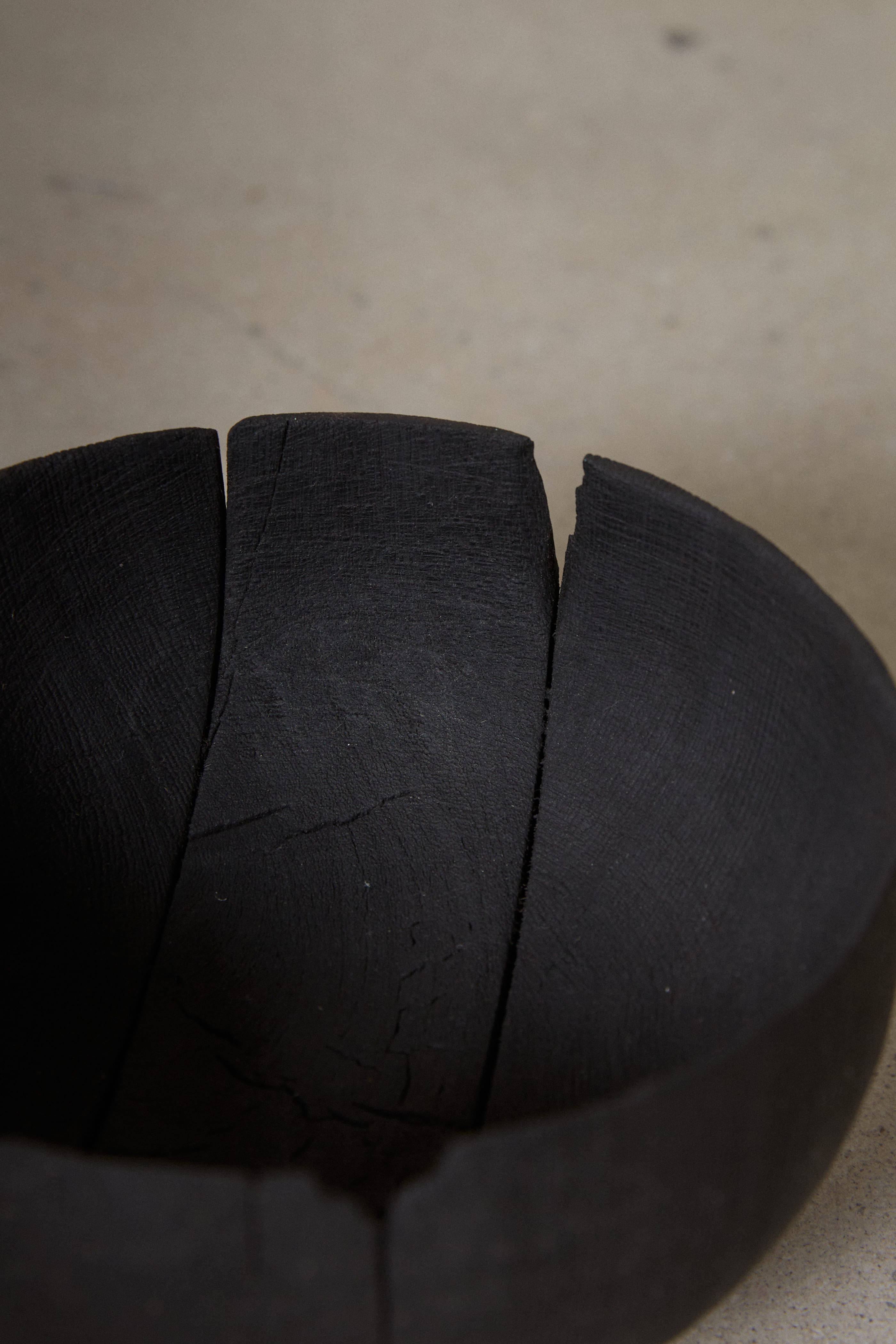 Rich matte black finish on raw edge footed black Yakisugi Bowl from CARMWORKS.