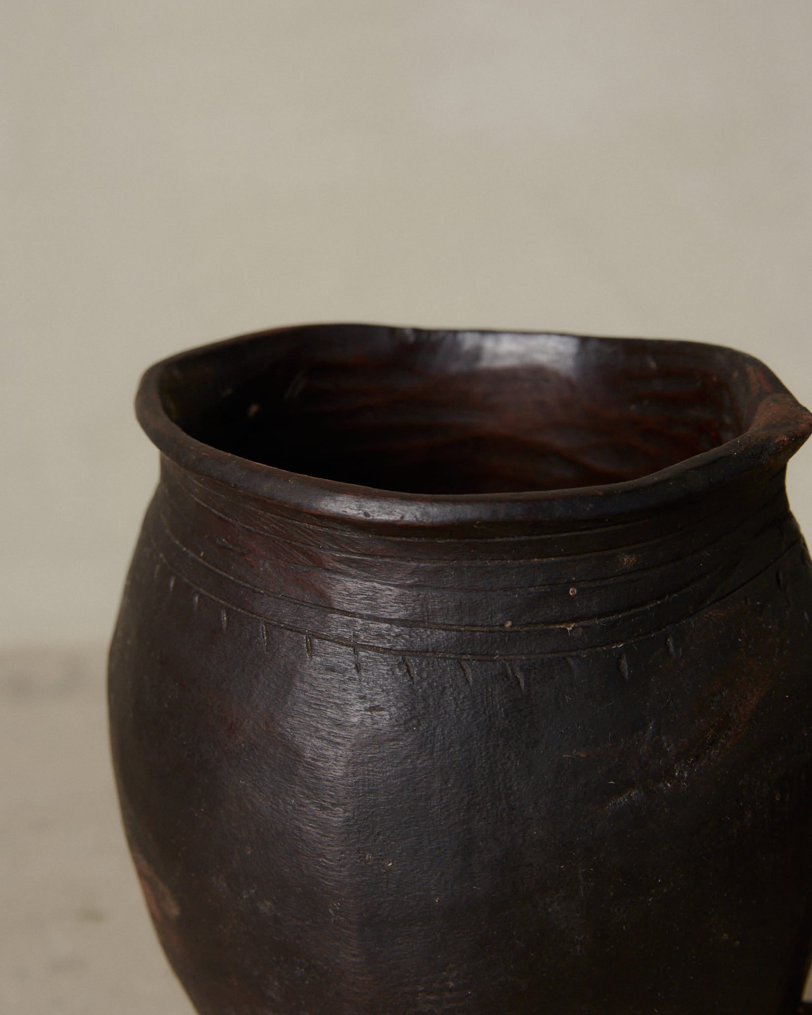 Anton Pitcher. Rare vintage find. Small, hand carved milk pitcher with artful etching details in dark natural wood. 