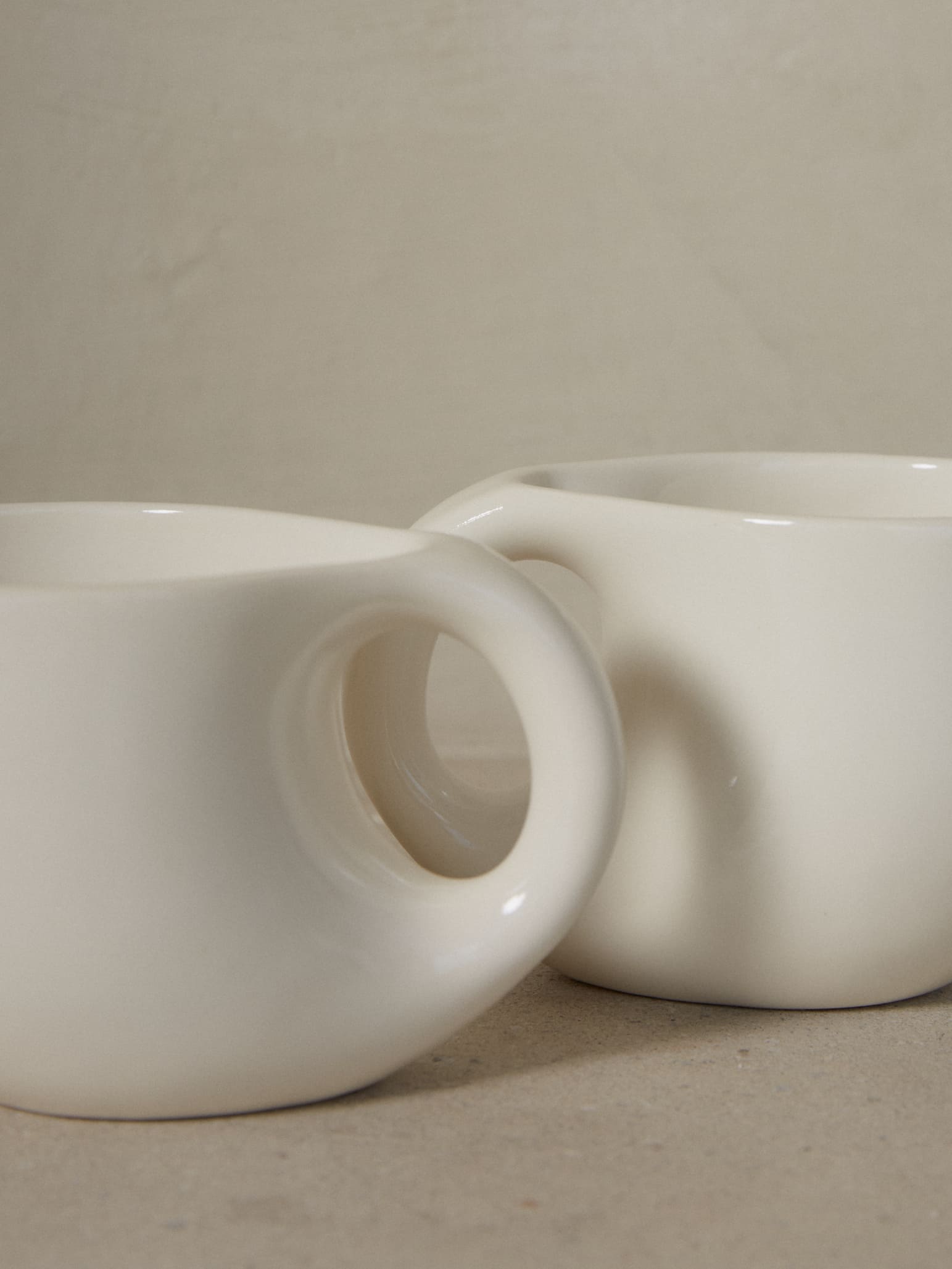 A sculptural, soothing mug embodying comfort and function that elevates the sipping experience to a sacred place. 