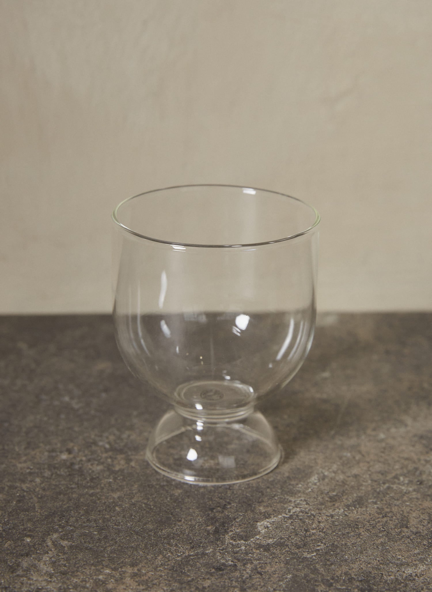 Still Glasses Set of 2. Rooted in simplicity and balance, this pair of gently rounded mouth-blown glasses feature an hourglass shape, making them ideal for wine as well as water.