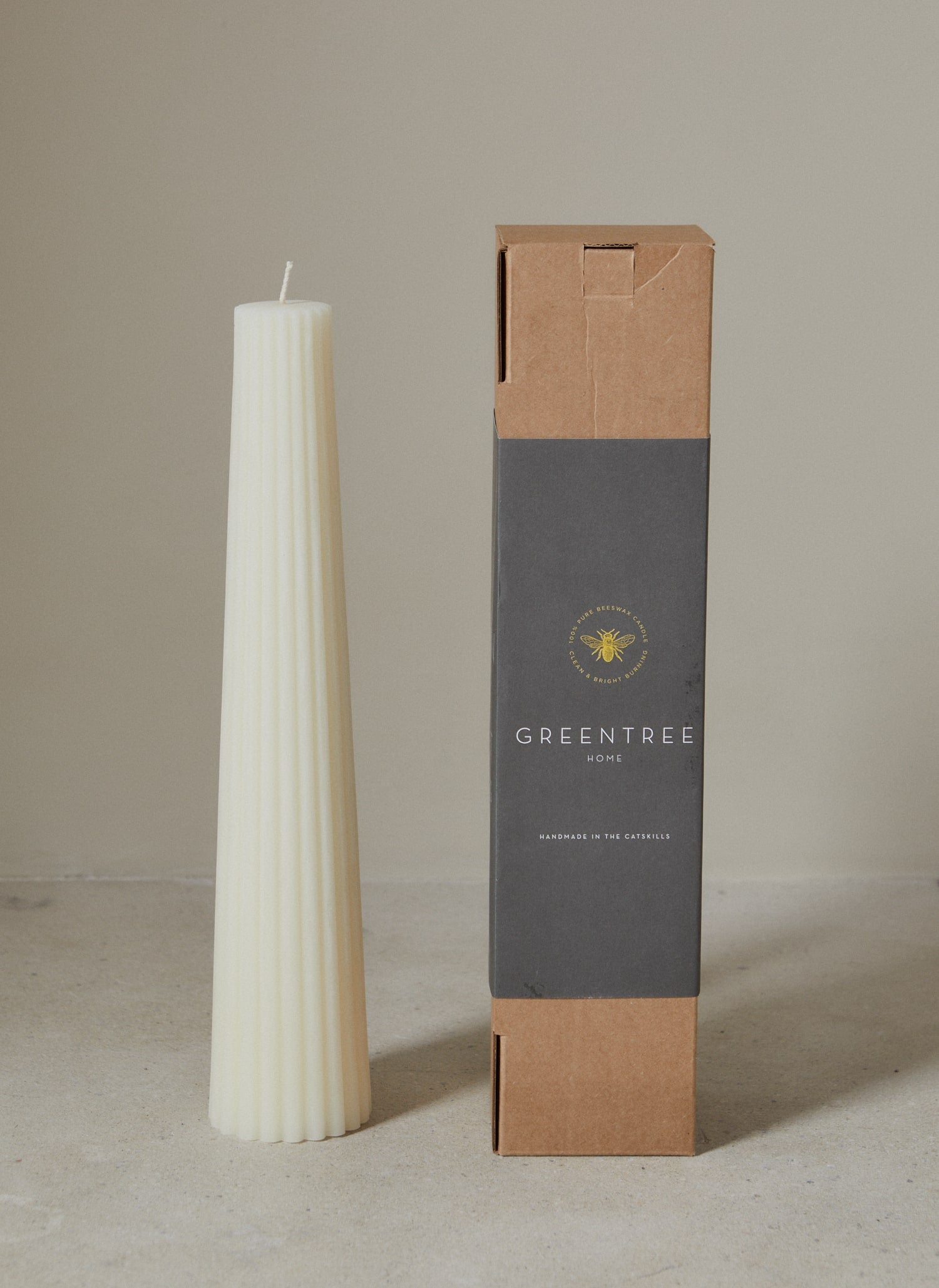 Cream Textured Pillar candle shown with gift box.
