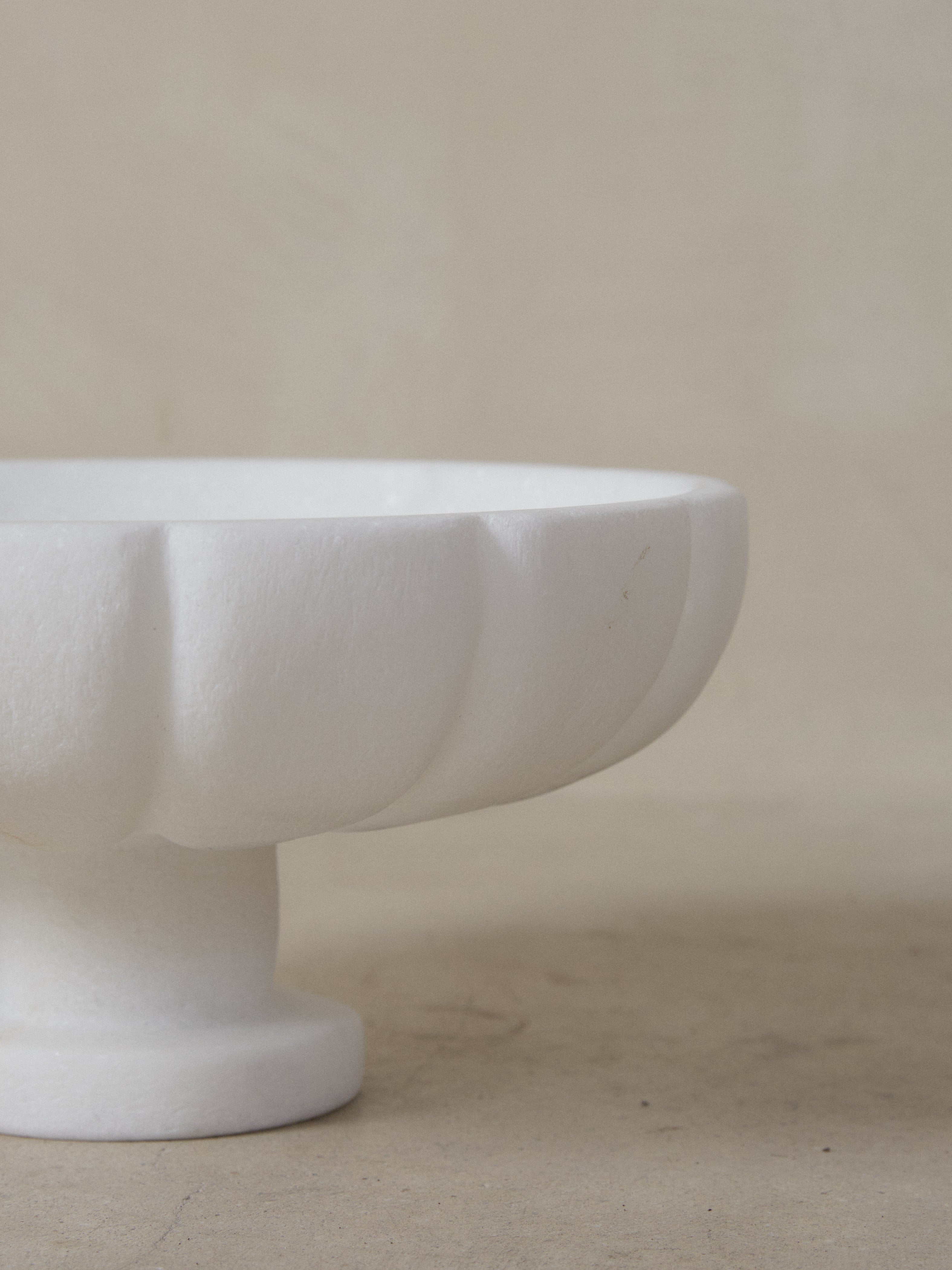 Hand carved details and footed shape on the Kalodromo Clive Bowl.