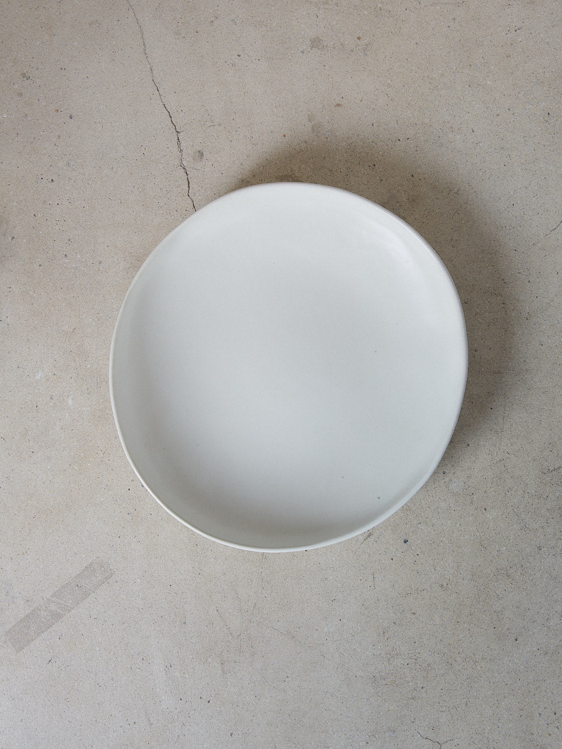 Large Raw Serving Bowl in Ecru. Handmade deep serving bowl perfect for entertaining and everyday use in classic matte white stoneware.