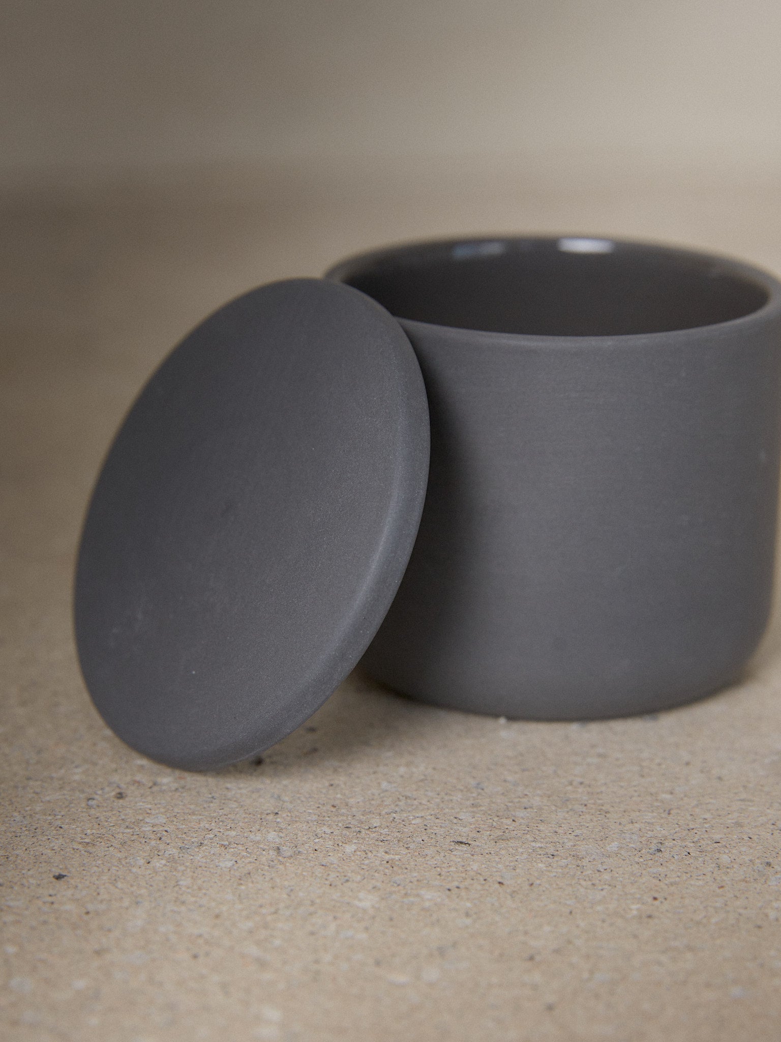Dark Grey Round Cose Box. A study in refined simplicity, the Round Cose Box by Bertrand Lejoly for Serax adds subtle luxury to any bathroom or kitchen.
