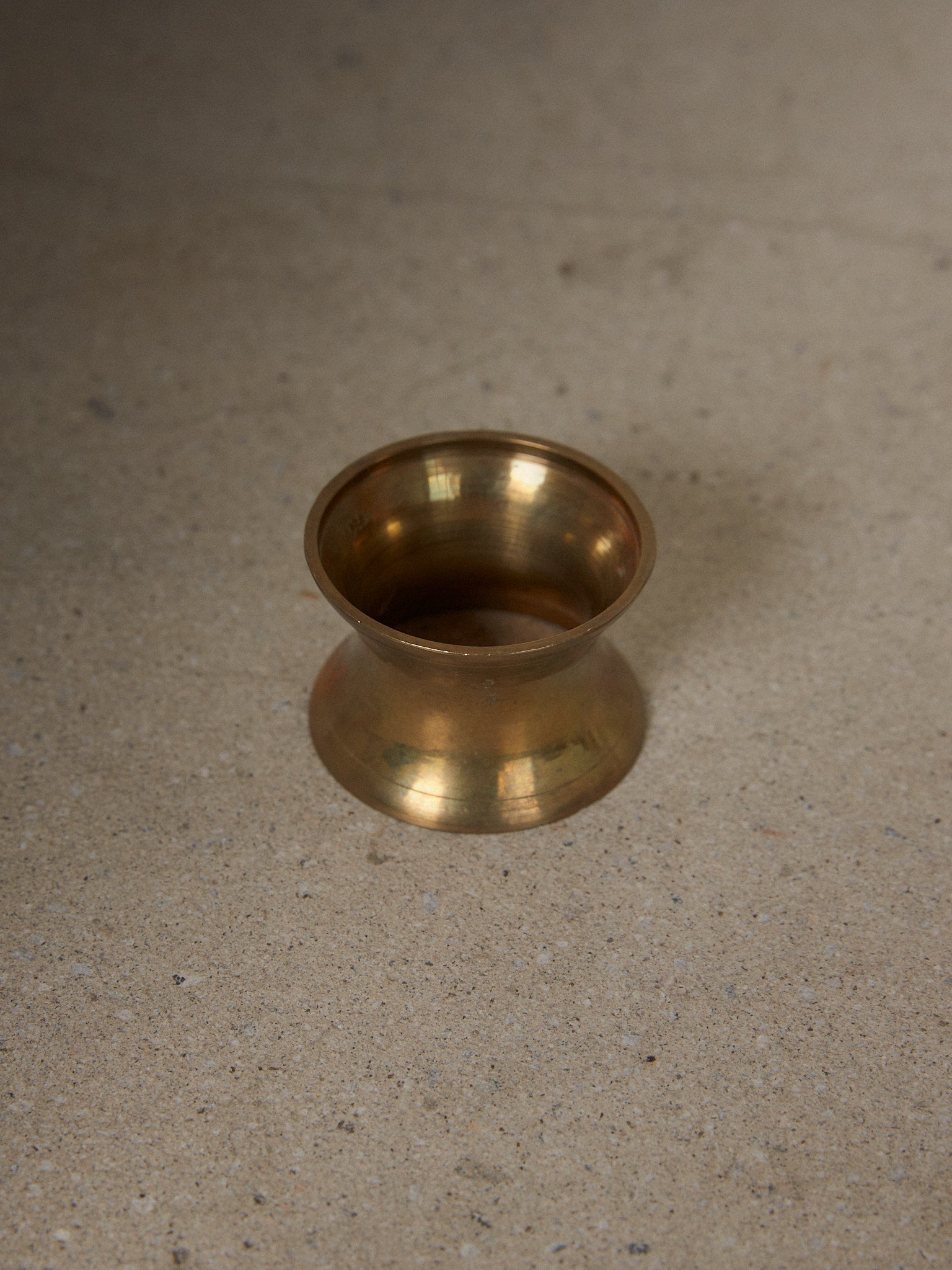 Curve Napkin Ring Set. Rare vintage find. Set of six minimalist solid brass napkin rings with a distinctively curved bodice.