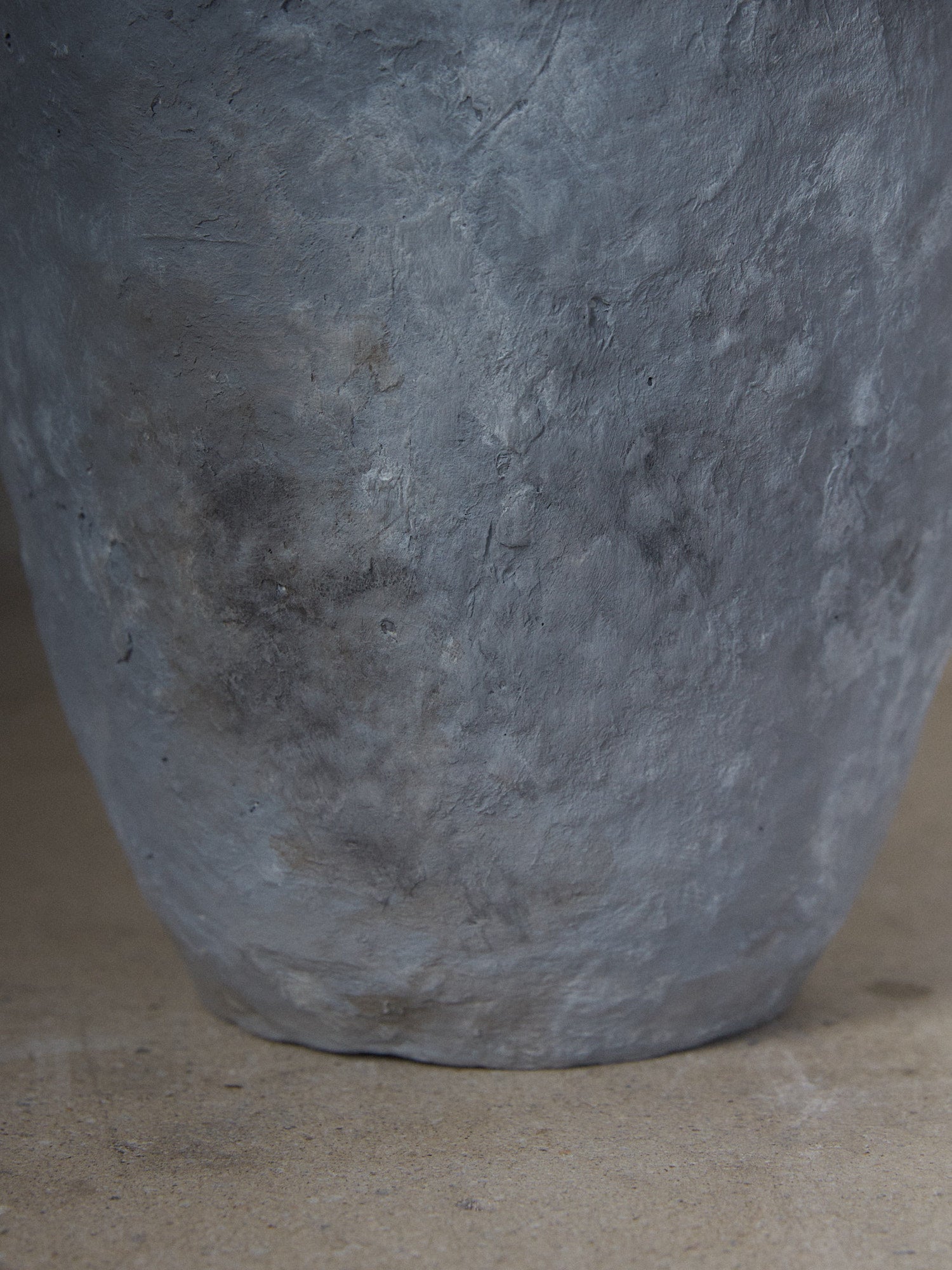 Johanne Vase. Rare find. Hand sculpted, slim footed textural vase in stone grey tones made from sustainable paper maché. 