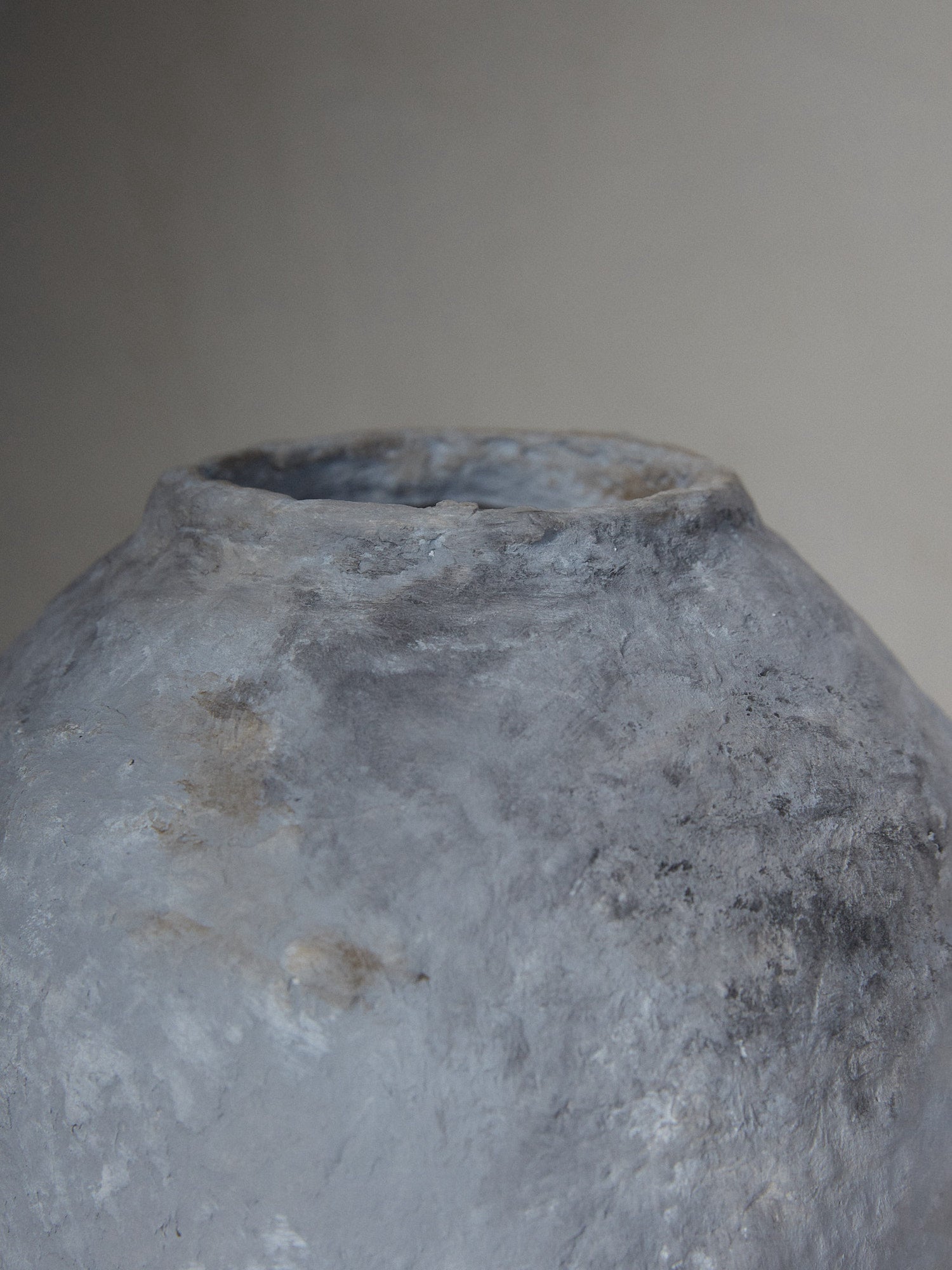 Johanne Vase. Rare find. Hand sculpted, slim footed textural vase in stone grey tones made from sustainable paper maché. 