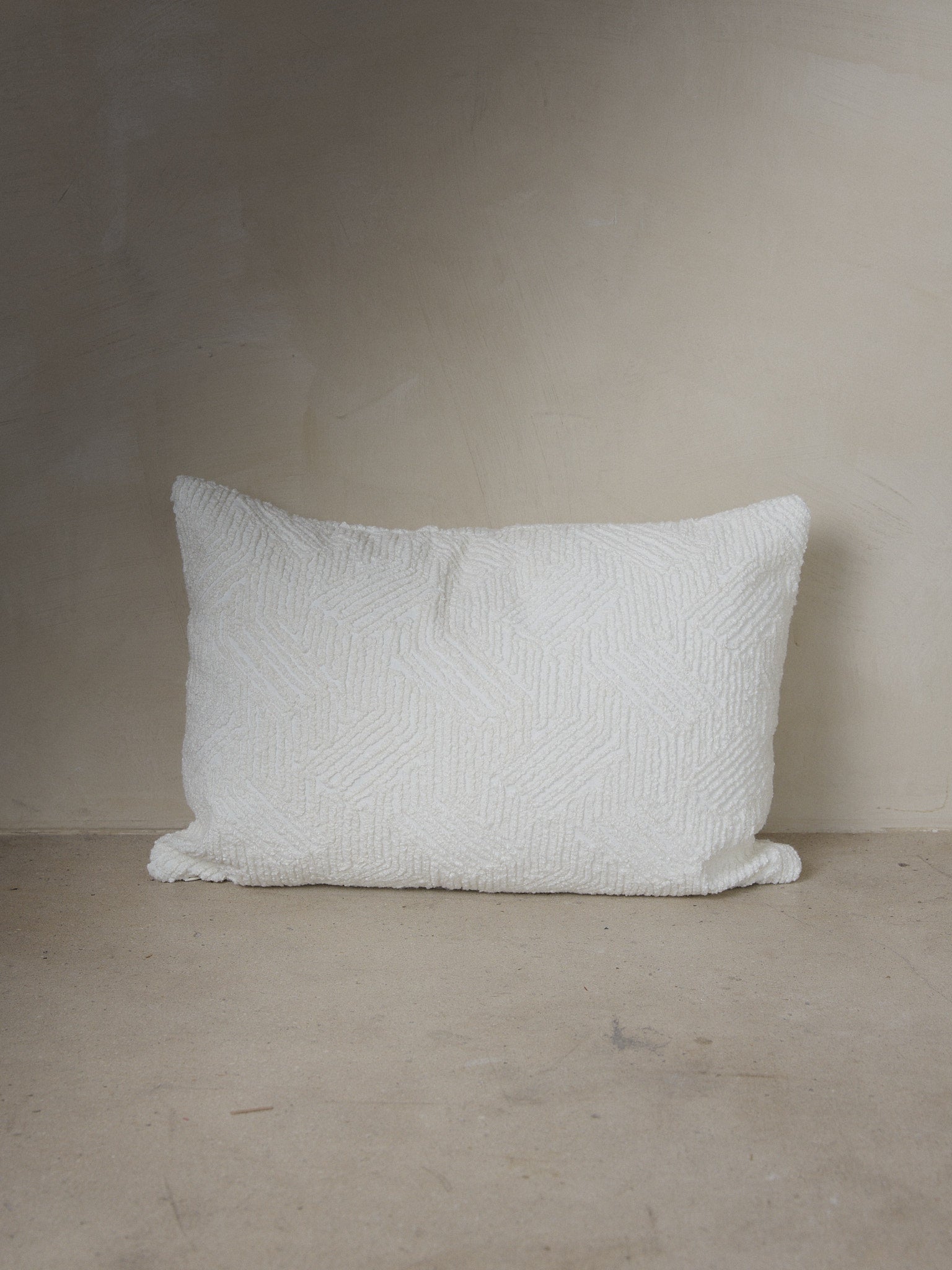 Tamara Pillow. Rare find. Neutral, double-sided lumbar pillow cover with textural geometric boucle yarns in a pure, creamy white.