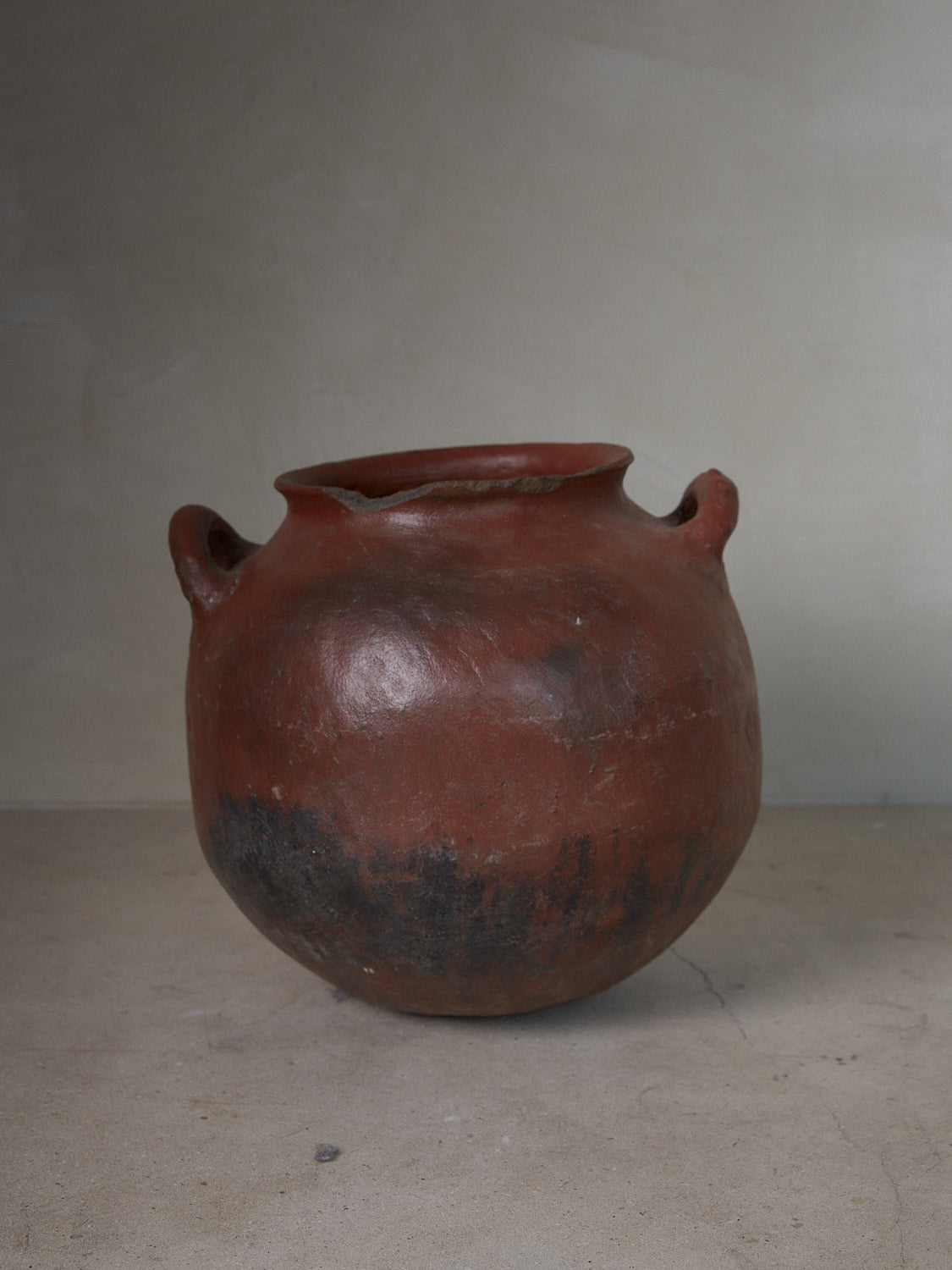 Vase Faris. Rare find. Large antique ceramic vase with round bodice, wide lip and low-sitting handle details at sides.