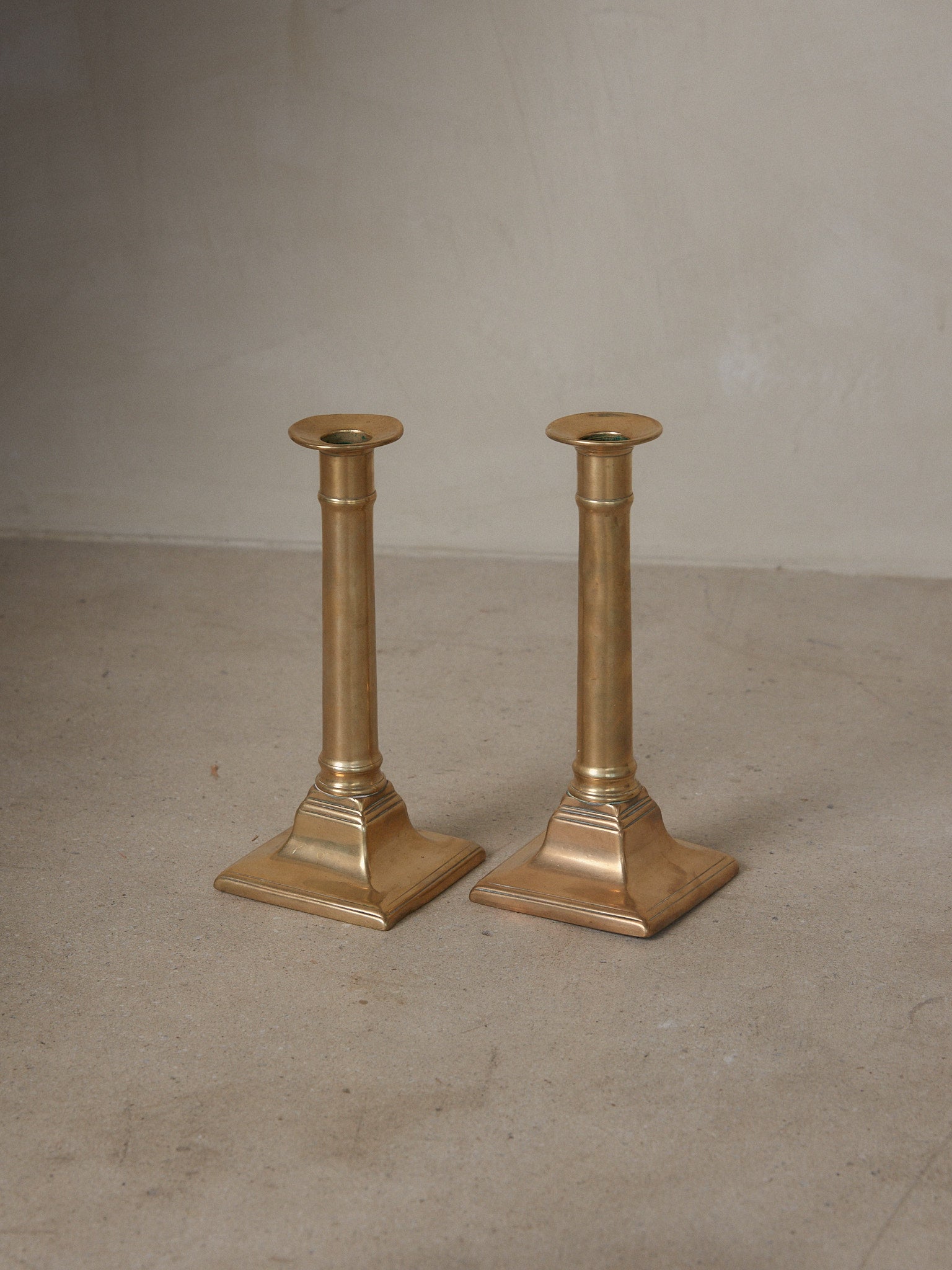 Vintage Push Up Candle Holders. Rare vintage find. Pair of stately 19th century English column candle holders with push up mechanism in brass.