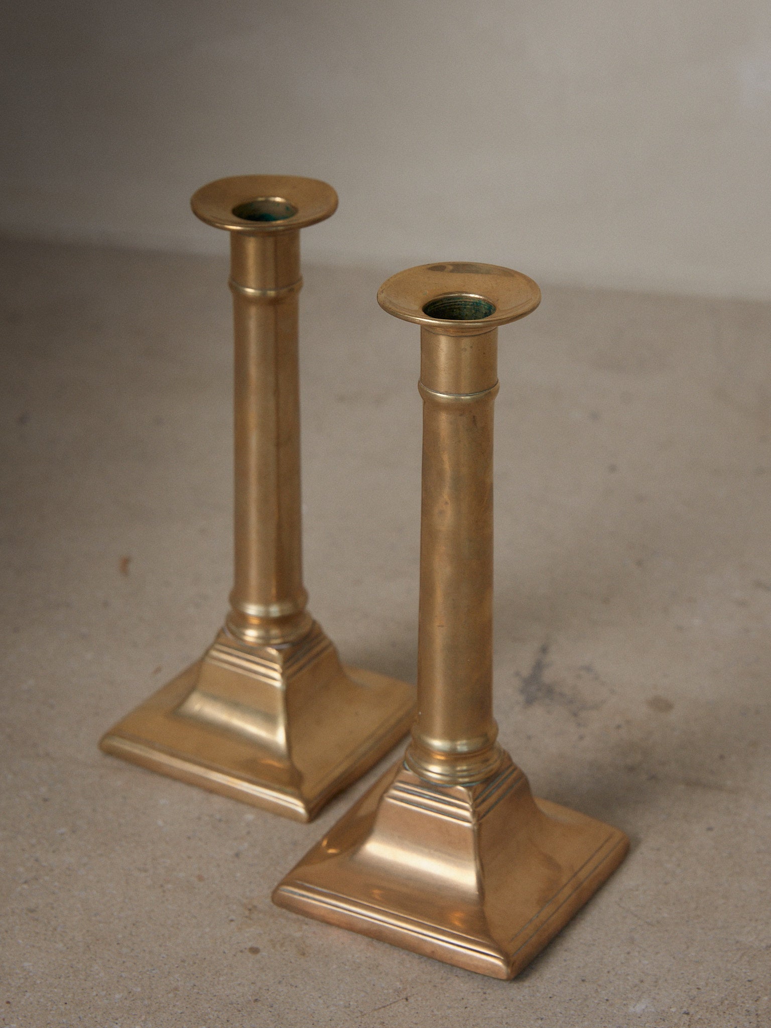 Vintage Push Up Candle Holders. Rare vintage find. Pair of stately 19th century English column candle holders with push up mechanism in brass.