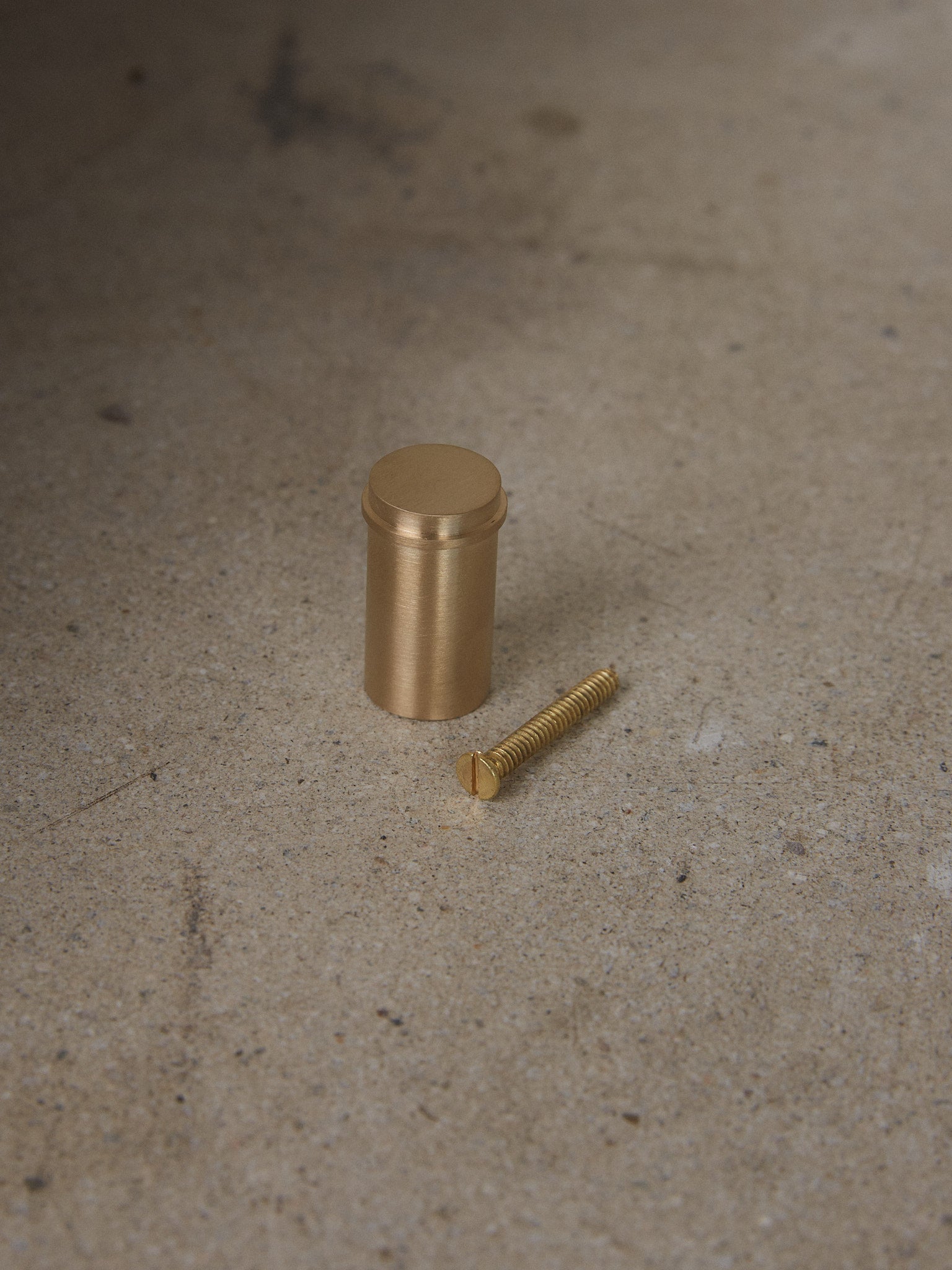 Small Brass Hook. Minimal and timeless round brass hook designed to adorn walls for hanging coats, bags or other necessities. 