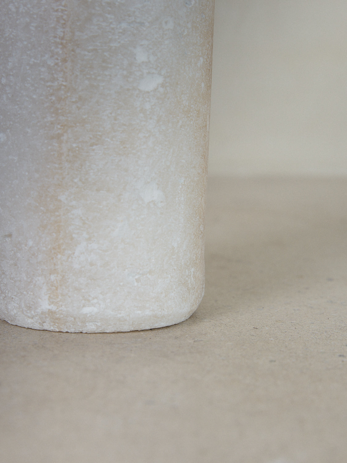 Salt Candleholder. Tall cylindrical candleholder emitting soft, filtered light through natural crystals hand carved of compressed salt