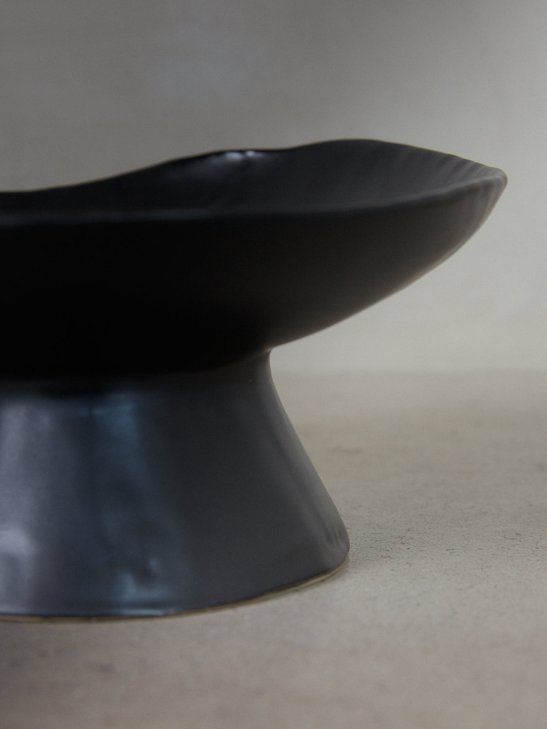 Black Raw Pedestal. Exclusively ours. Handmade ceramic compote bowl with tapered pedestal foot base in a matte black finish