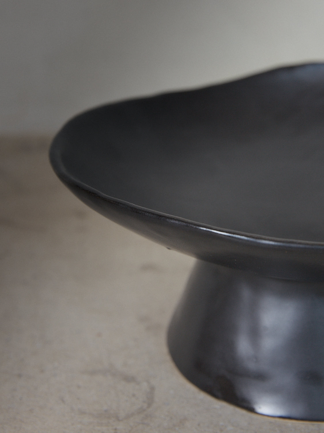 Black Raw Pedestal. Exclusively ours. Handmade ceramic compote bowl with tapered pedestal foot base in a matte black finish