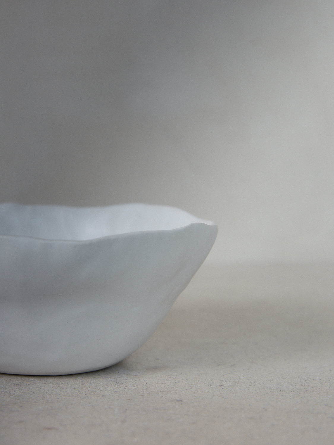 Raw Cereal Bowl. Deep, stackable handmade cereal bowl designed to complement your mornings in classic matte white stoneware. 