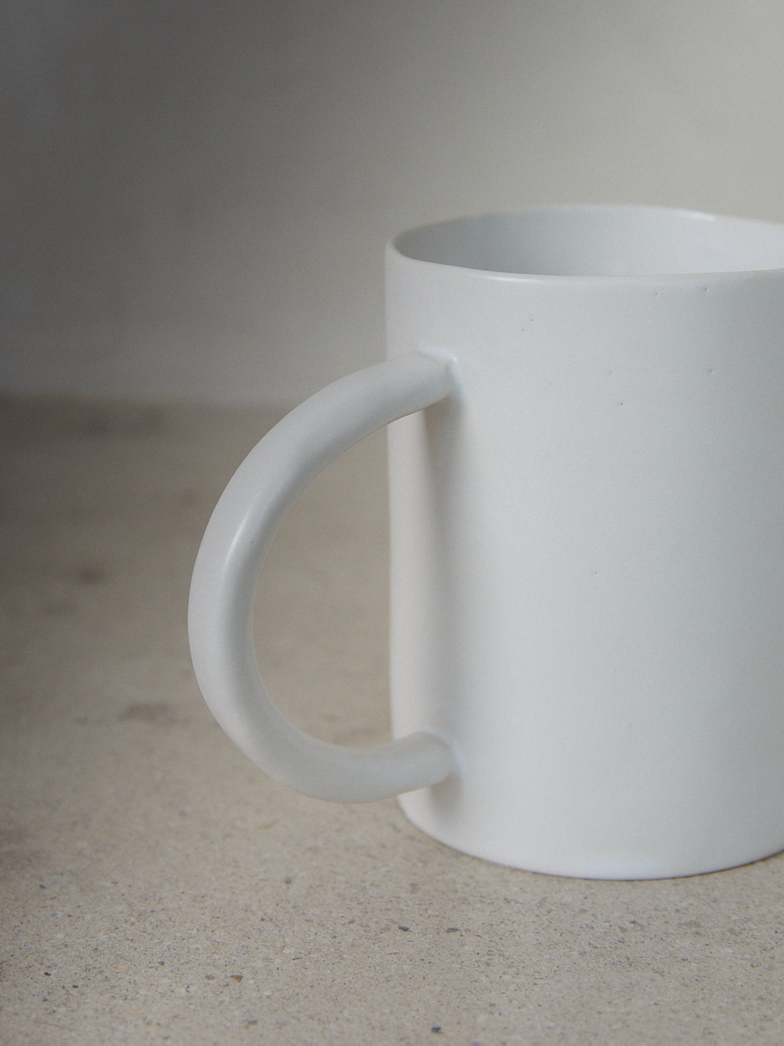 Raw Coffee Mug. Exclusively ours. Handmade oversized coffee mug designed to complement your mornings in classic matte, milky white stoneware. 