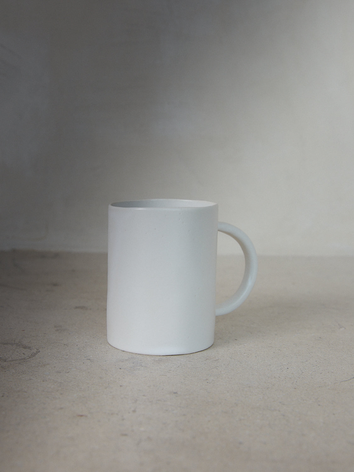 Raw Coffee Mug. Exclusively ours. Handmade oversized coffee mug designed to complement your mornings in classic matte, milky white stoneware. 