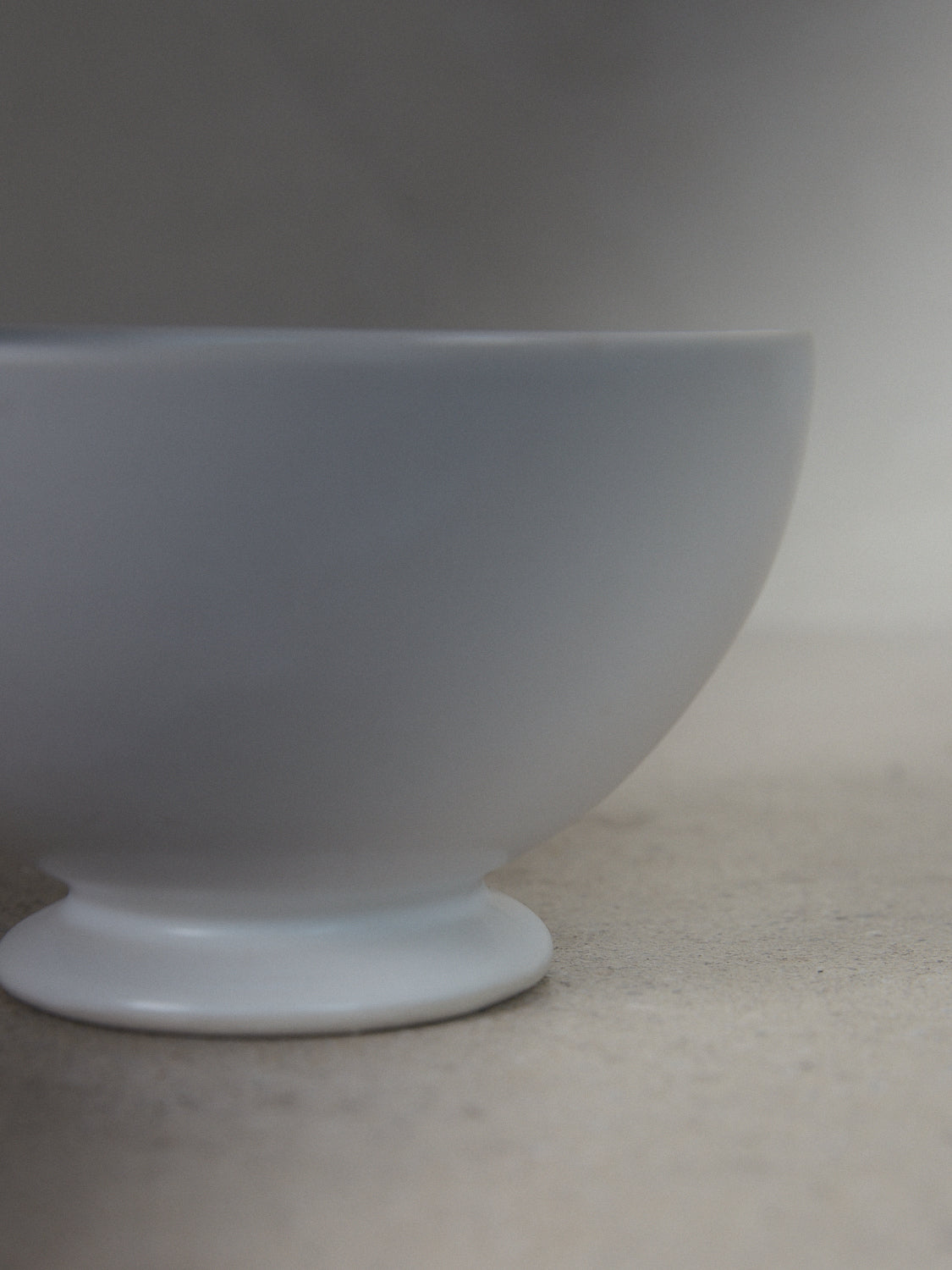 Raw Latte Bowl. Exclusively ours. Traditional hand sculpted French footed latte bowl in  matte, milky white stoneware.