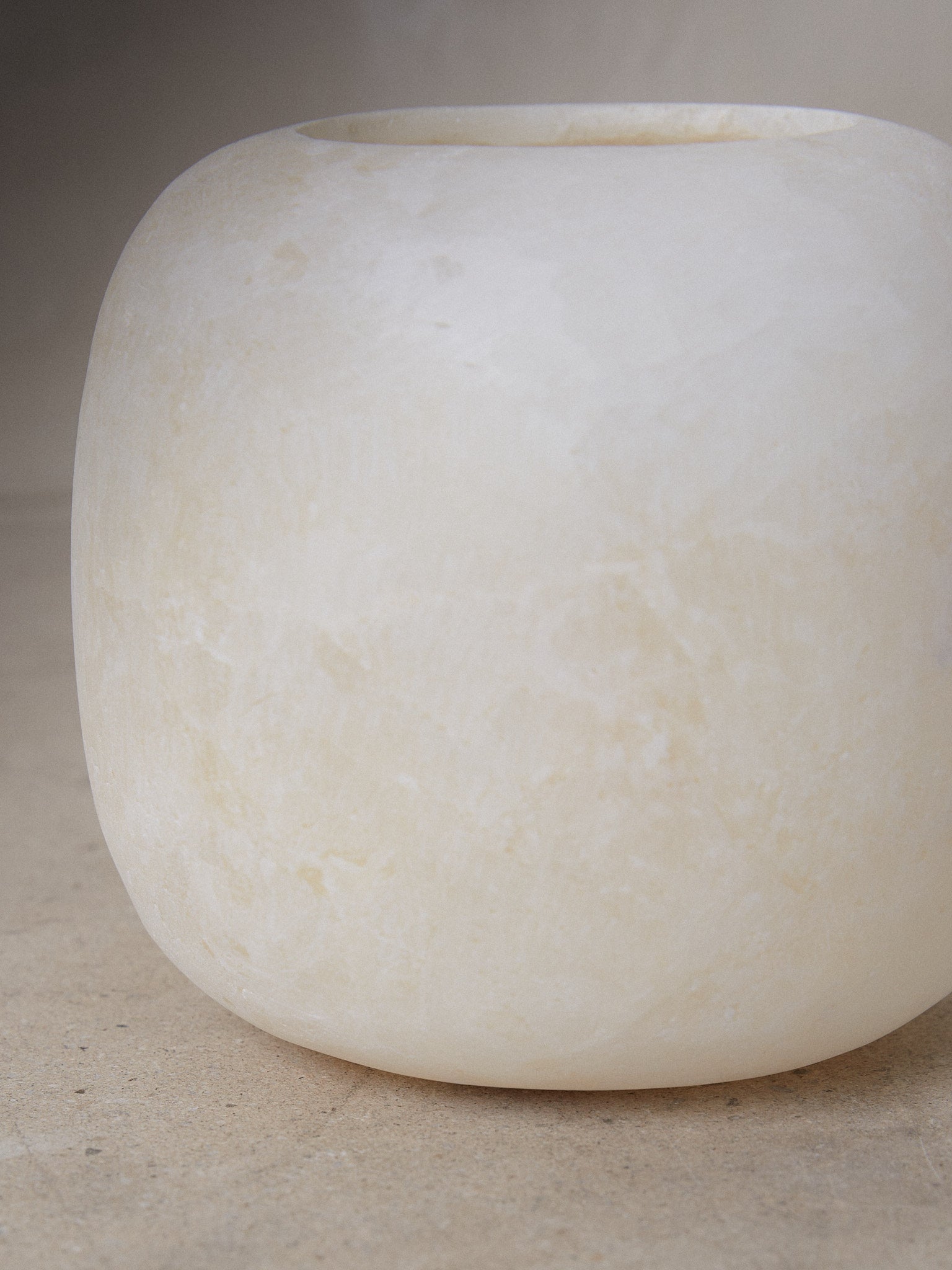 Raw Alabaster Vase. Unique find. Hand formed, round Egyptian stone vase made from matte crystallized alabaster in a multi-step carving process for our Raw Collection.