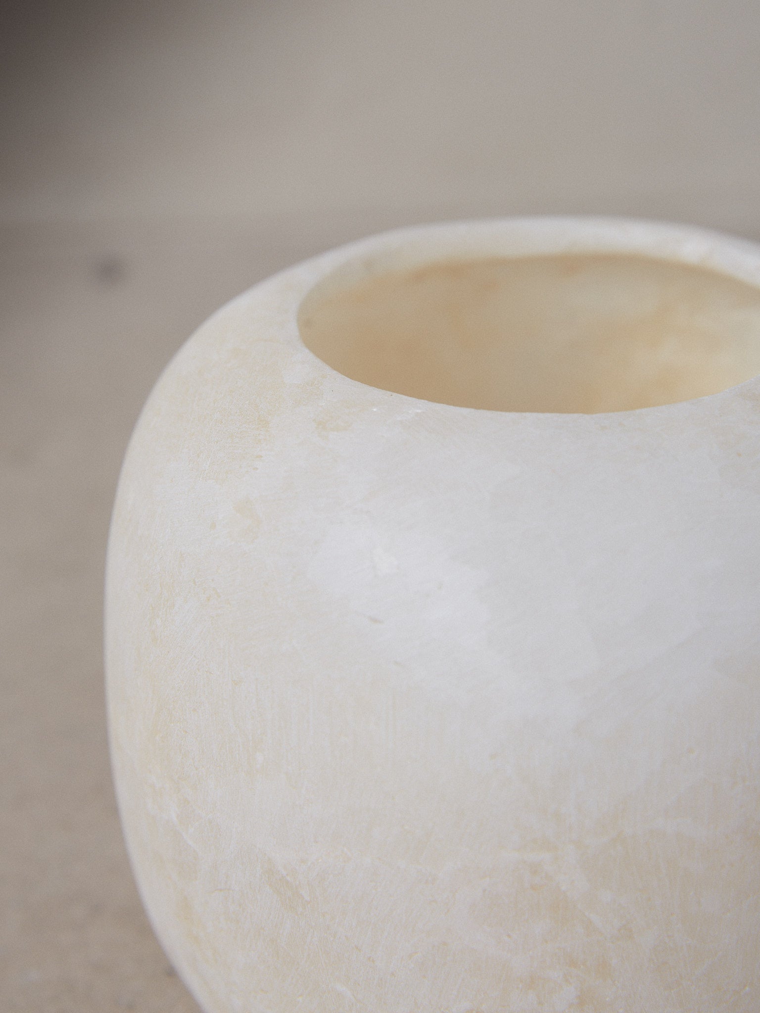 Raw Alabaster Vase. Unique find. Hand formed, round Egyptian stone vase made from matte crystallized alabaster in a multi-step carving process for our Raw Collection.