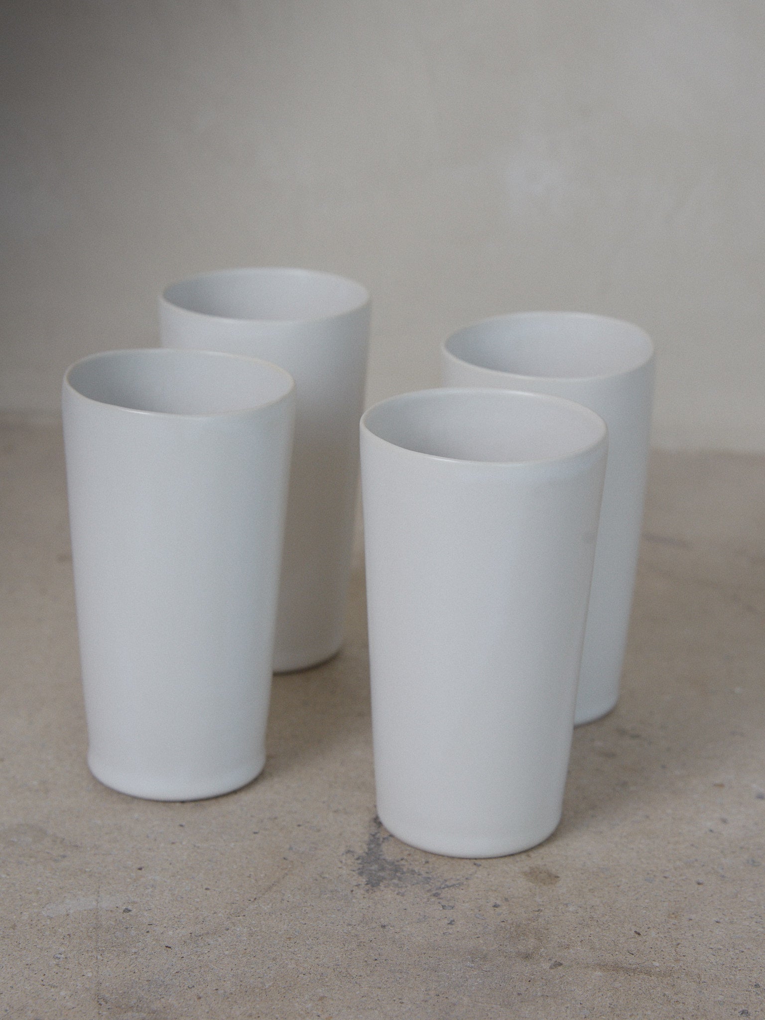 Raw Tumbler. Exclusively ours. Our hand crafted ceramic tumblers are a casual everyday essential for cold or hot beverages in classic matte, milky white stoneware.